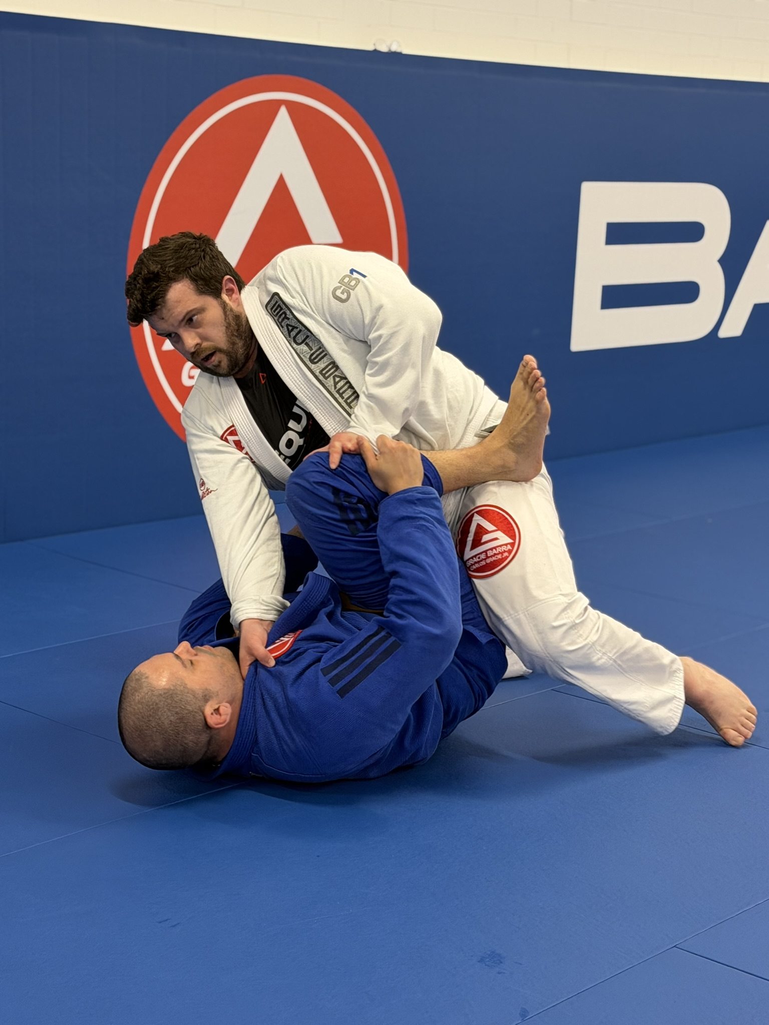 Adults training Brazilian Jiu-Jitsu as a healthy hobby at Gracie Barra Artarmon