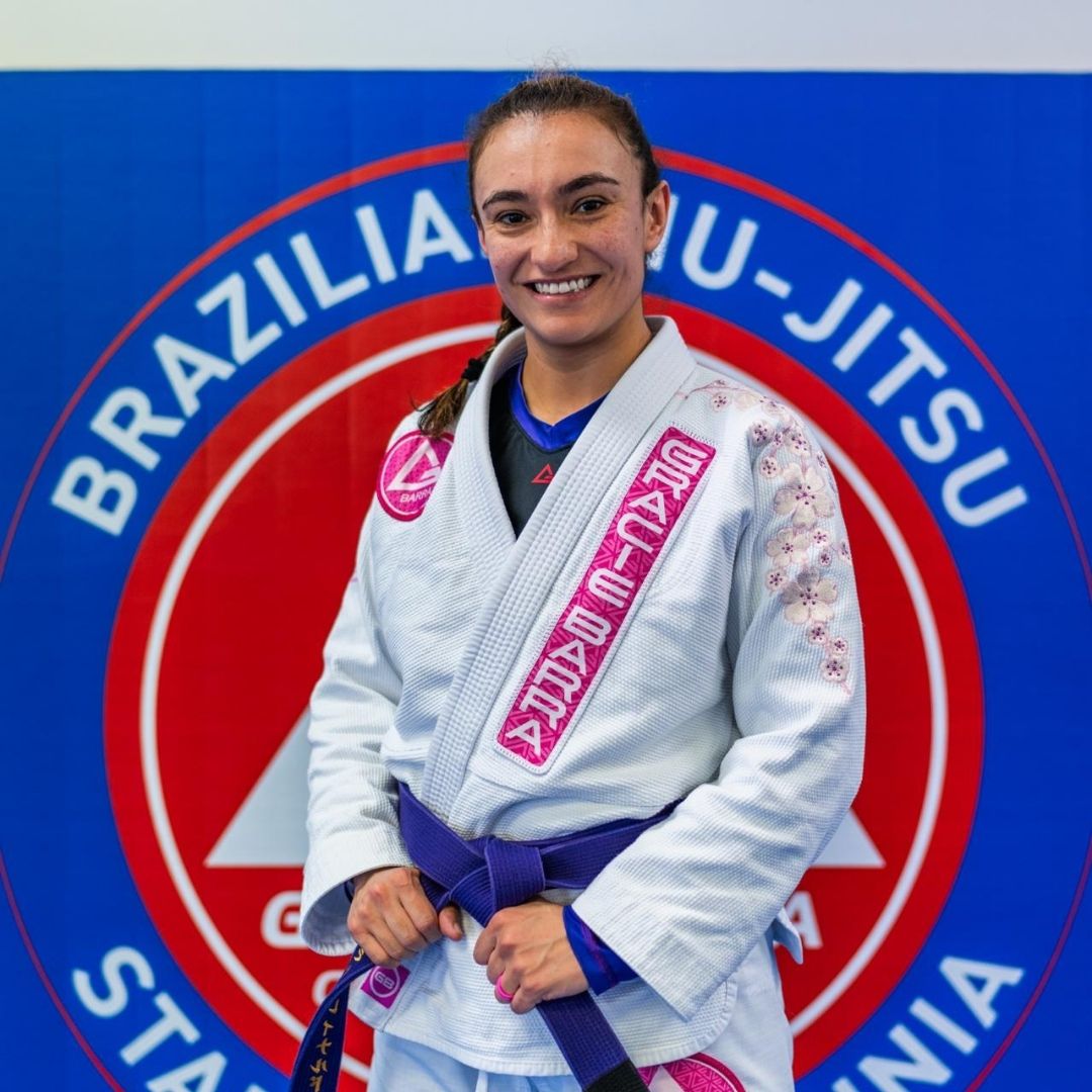 Coach Jilari Reinaldo teaching kids and adults at Gracie Barra Stafford